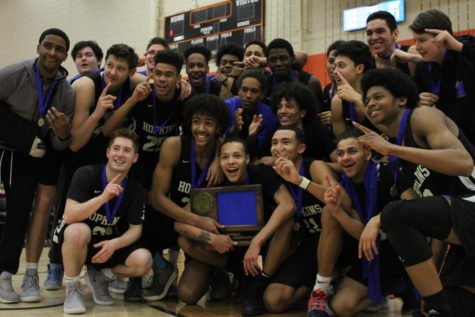 Boys team poses after section final victory. The Royals got a bid to a state tournament in the win.