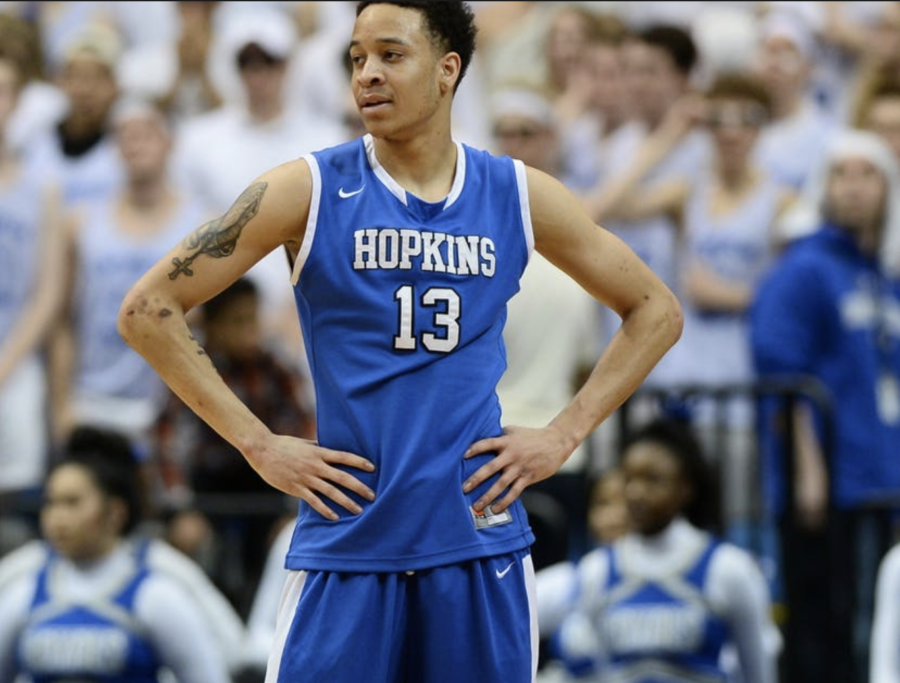 HHS alumnus Amir Coffey leads gophers to end of season hot streak with tournament birth on the line