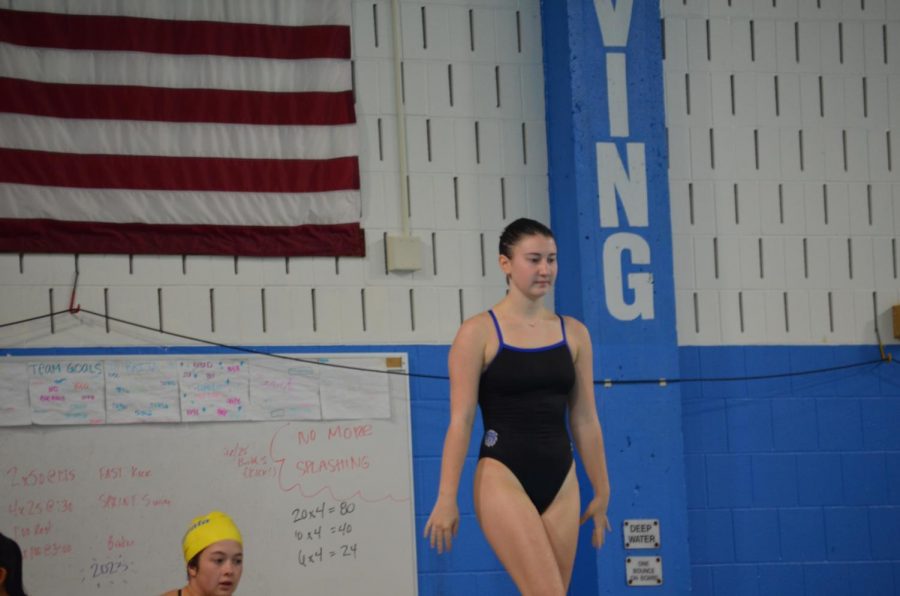 Kaija Pratt, senior, preparing for a dive. Pratt looks to have a deep run in sections and make it to state.
