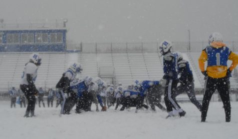Football continues to practice despite severe weather